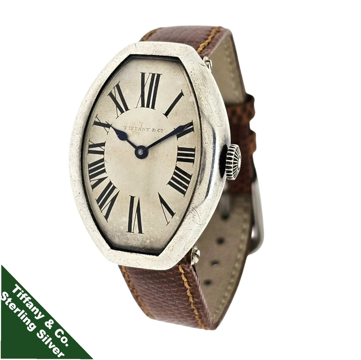Tiffany & Co. Antique Silver Tonneau shaped watch 35x26mm center