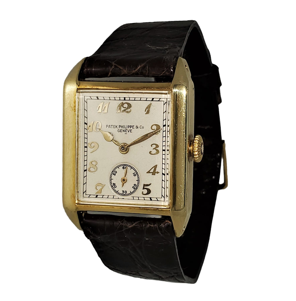 Patek Philippe early Art Deco rectangular tank style watch, 18K with Breguet numerals Circa 1928, Retailed by Beyer