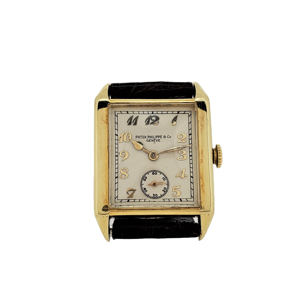 Patek Philippe early Art Deco rectangular tank style watch, 18K with Breguet numerals Circa 1928, Retailed by Beyer