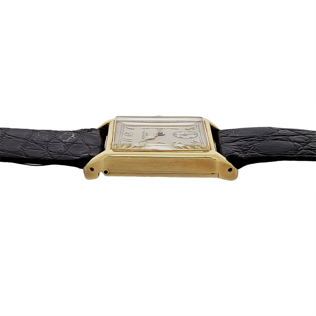 Patek Philippe early Art Deco rectangular tank style watch, 18K with Breguet numerals Circa 1928, Retailed by Beyer