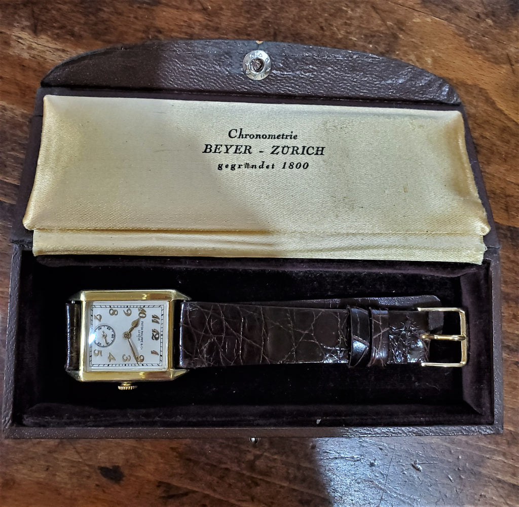 Patek Philippe early Art Deco rectangular tank style watch, 18K with Breguet numerals Circa 1928, Retailed by Beyer