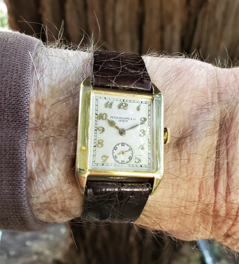 Patek Philippe early Art Deco rectangular tank style watch, 18K with Breguet numerals Circa 1928, Retailed by Beyer