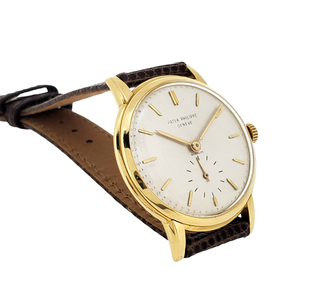 Patek Philippe 2484J 32mm Disco Volante Calatrava Watch, Circa 1957