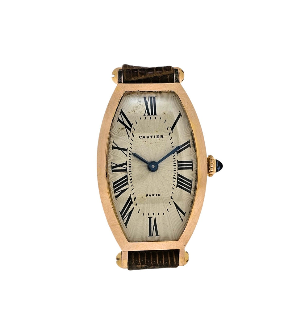 Cartier Paris Rose Gold Tonneau shaped watch that curves on the wrist.  Circa 1990's