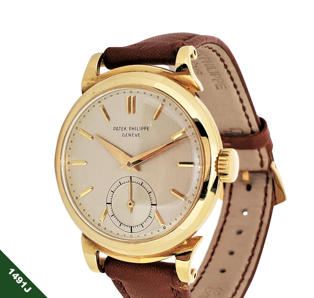 Patek Philippe 1491J Vintage Yellow Gold Scroll Lugs Calatrava Watch Circa 1952