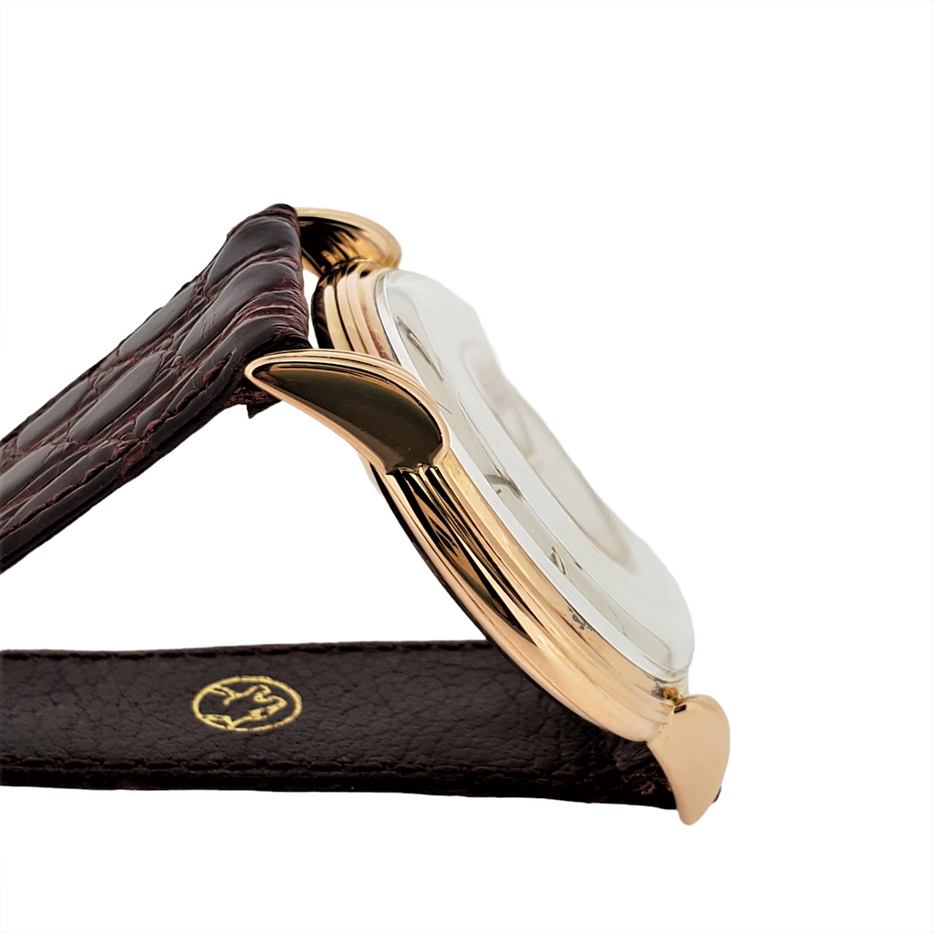 Patek Philippe 2405R Calatrava 35mm, with fluted case and down turned lugs, Circa 1948