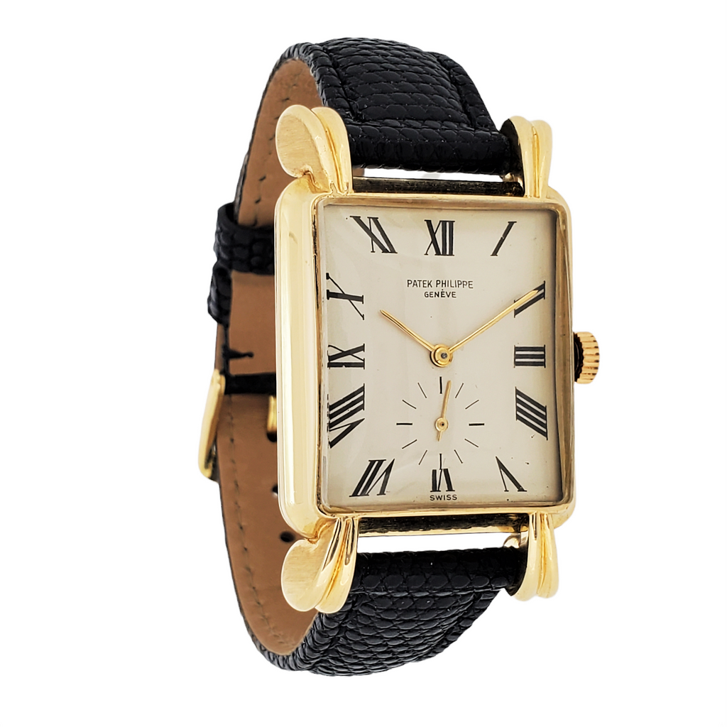 Patek Philippe 2440J,  Massive rectangular shaped case large flared fluted lugs Circa 1949-50