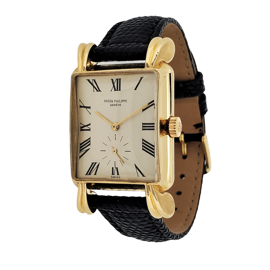 Patek Philippe 2440J,  Massive rectangular shaped case large flared fluted lugs Circa 1949-50