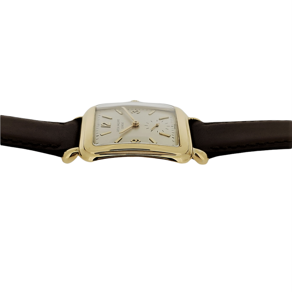 Patek Philippe 2493J-An oversized Cushion shaped case with tear drop lugs; Circa 1950