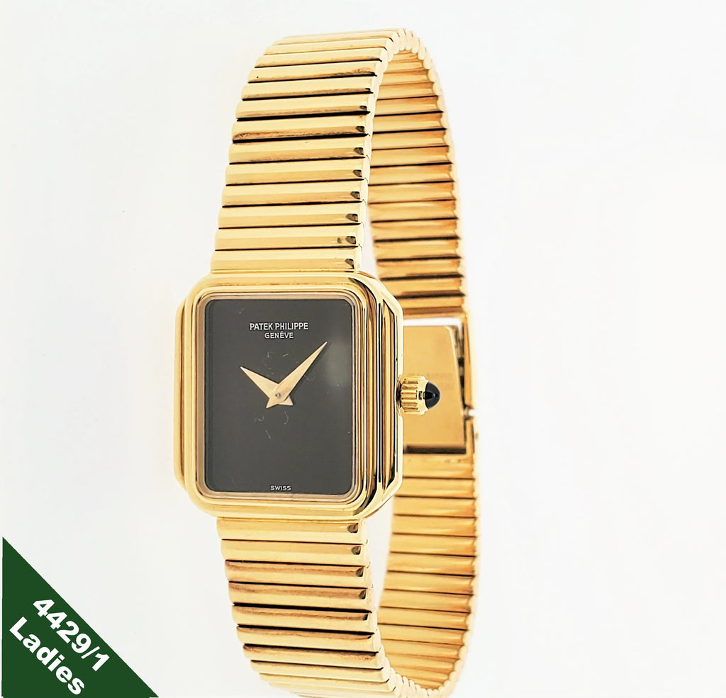 Patek Philippe Ladies 4429/1J Gold Bracelet Watch with Onyx Dial, Circa 1991